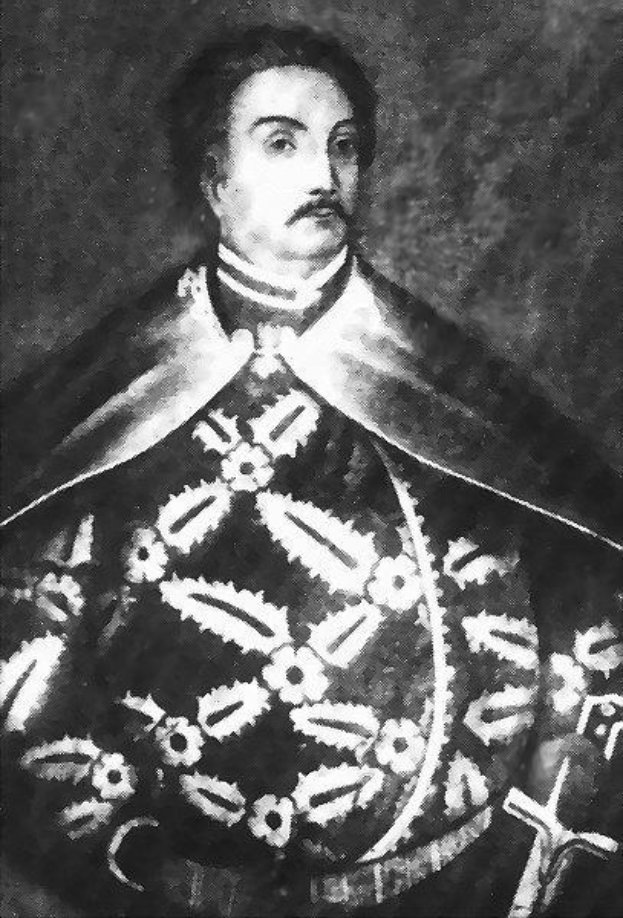 Schwarzes und weißes Foto von Papst Johannes Paul II. in Priesterrobe, trägt eine schwarze Robe mit weißem Kragen und Manschetten, Hände verschränkt, strenger Gesichtsausdruck, direkter Blick.